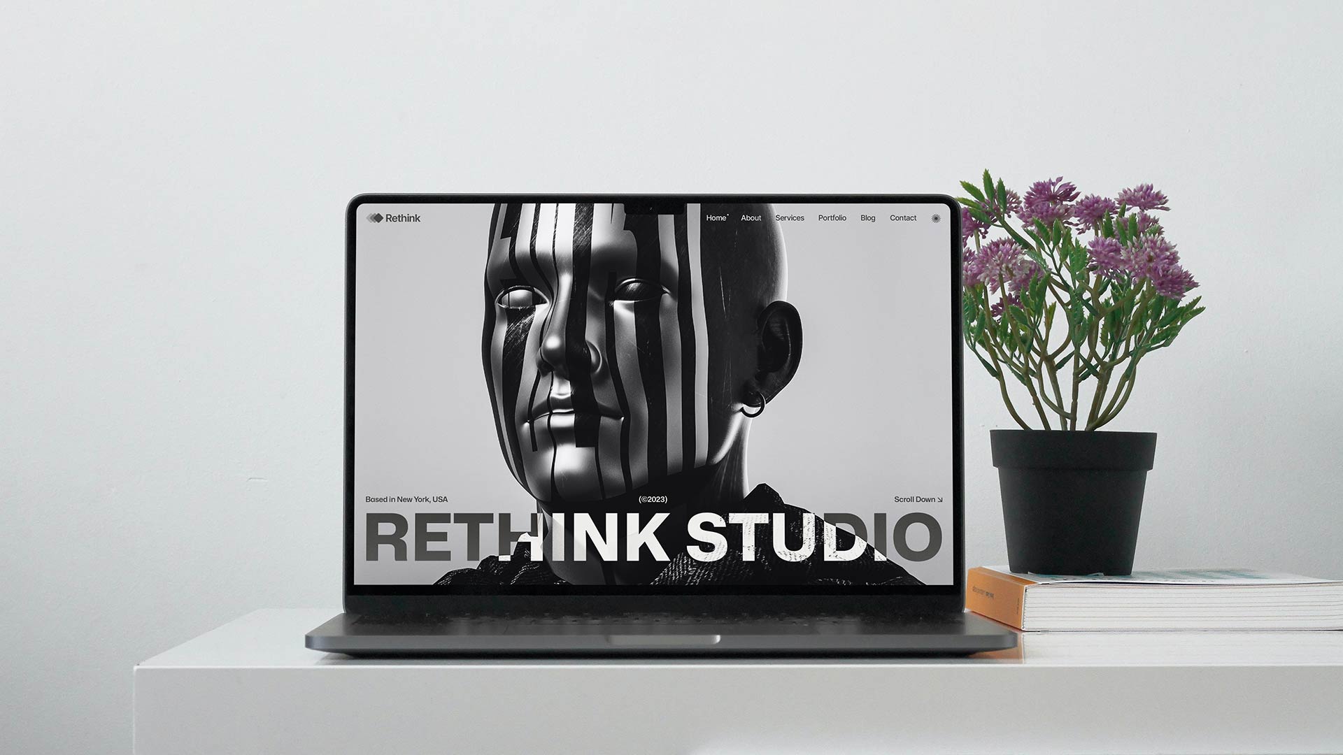 Placeholder product image displayed on a laptop